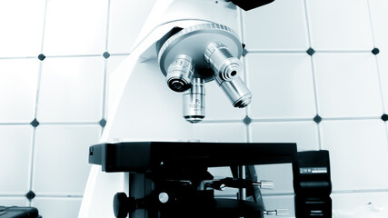 research optical microscope in blue tones
