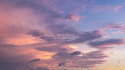 A sunset sky. Abstract nature background. Dramatic blue with orange clouds at twilight.