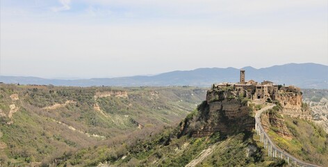 Fototapeta na wymiar Awe-inspiring view of the majestic mountain with the ancient city of Bagnoregio