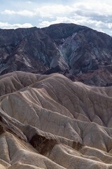 Aerial view of Zabriskie Point in Death Valley National Park with majestic mountains