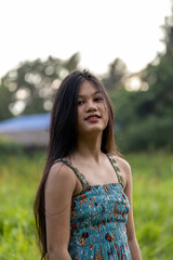 Naklejka premium little girl with black long hair looking to the camera