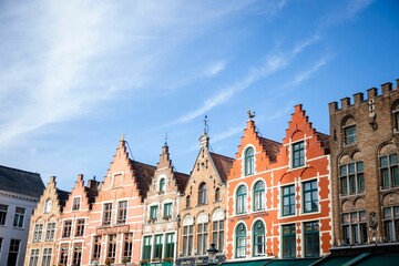 Fototapeta na wymiar Aerial view of Markt in Bruges, Belgium, featuring a vibrant line of buildings