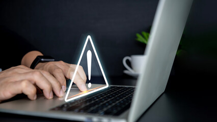 Businessman using computer laptop with triangle caution warning sing , Http 404 error not found...