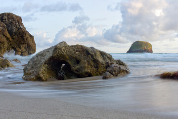sea washing the rocks on the beach