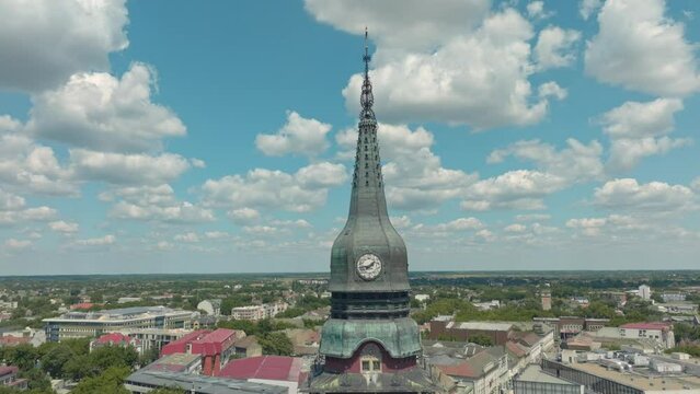 Architectural complex, clock tower, church.