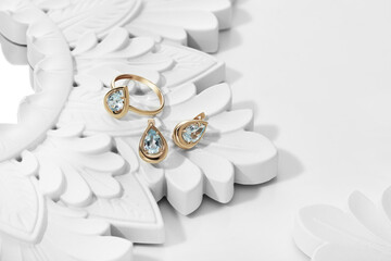 Elegant jewelry set. Jewellery set with gemstones. Jewelry accessories collage. Product still life...