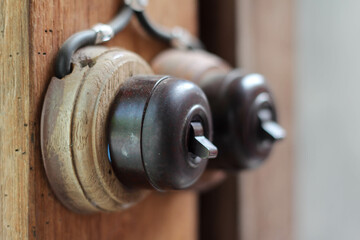Vintage style electrical switch on a wooden pole