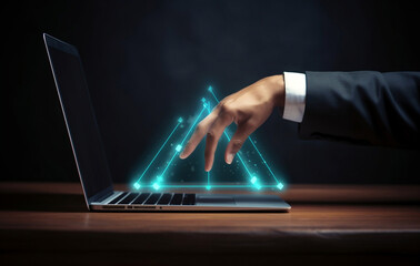 Businessman's hand touches laptop keyboard and blue neon lines. Information technology concept.