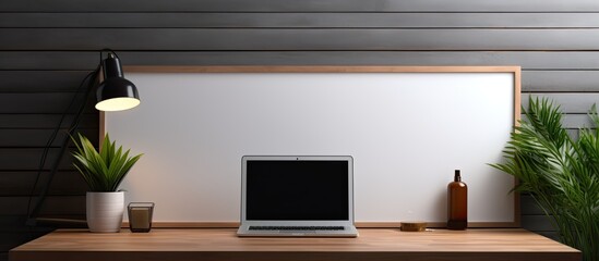 A trendy office setting with a laptop. Empty screen area for personalized designs.