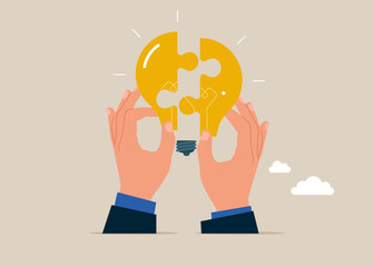 Holding a light bulb puzzle in his hand to connect. Working together to succeed. Vector illustration