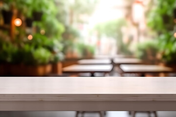 Obraz na płótnie Canvas Empty wooden table with defocused restaurant in the background, to place product or advertising