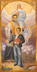 Fototapeta na wymiar NAPLES, ITALY - APRIL 21, 2023: The painting of Jesus with the St. Don Bosco, Dominic Savio in church Chiesa di Sacro Cuore by P. Camilleri (2006). 