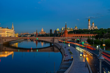 Fototapeta na wymiar Night view of Moscow Kremlin and Moskvoretskaya embankment in Moscow, Russia. Architecture and landmarks of Moscow. Postcard of Moscow
