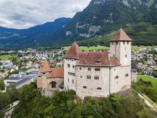 Aerial image of the medieaval castle on the rock Gutenberg Castle in Liechtenstein.
