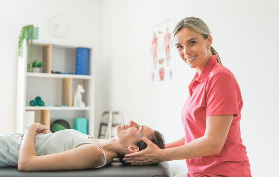 Modern rehabilitation physiotherapy clinic with professional and client