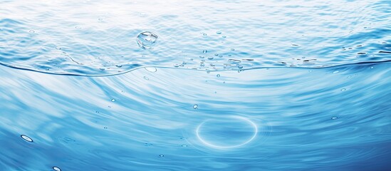 Naklejka na ściany i meble The water panoramic banner background is a flat lay image of water texture with rings and ripples. It is a spa concept background with copy space for composition.