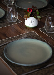 Restaurant table minimal decor during Winter and Christmas Eve, Braga, Portugal.