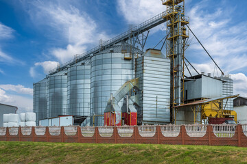 Fototapeta na wymiar agro-processing plant for processing and silos for drying cleaning and storage of agricultural products, flour, cereals and grain