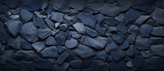 The background is a dark navy blue stone texture with a top view and copy space.