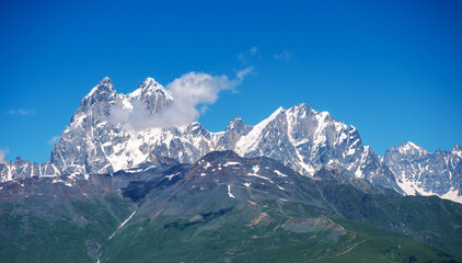 Fototapeta premium Snow Covered mountain peaks in Mestia, Svaneti, Georgia.