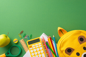 Elementary school education concept. Top view photo of colorful school supplies with yellow kid's...