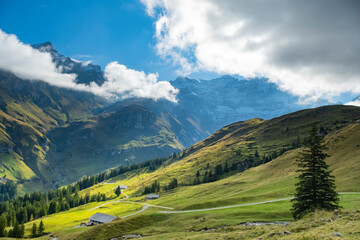 Obraz na płótnie Canvas Amazing touristic alpine village in valley, Switzerland attraction