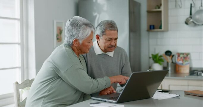 Home laptop, documents and senior couple reading financial bills, bank account invoice or mortgage info. Kitchen discussion, taxes and old woman, man or elderly people with retirement savings budget