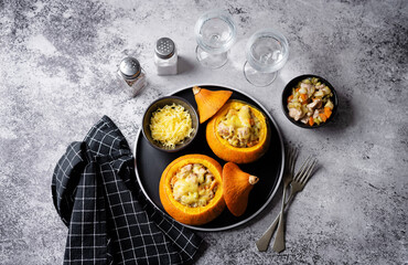 Pumpkin stuffed with chicken and carrots with celery