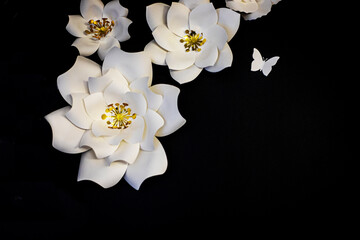 beautiful white decorative flowers on a dark background. Holiday, wedding, photo zone