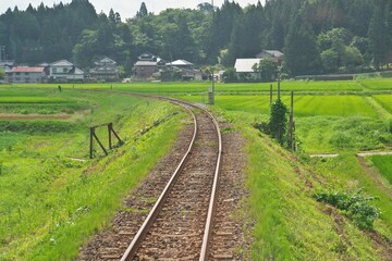 Akita, Japan - July 28, 2023: Single-track railway in rural zone in Akita, Japan
