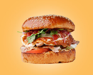 craft hamburger with marinated pork on a yellow background for a restaurant website, studio shooting 2