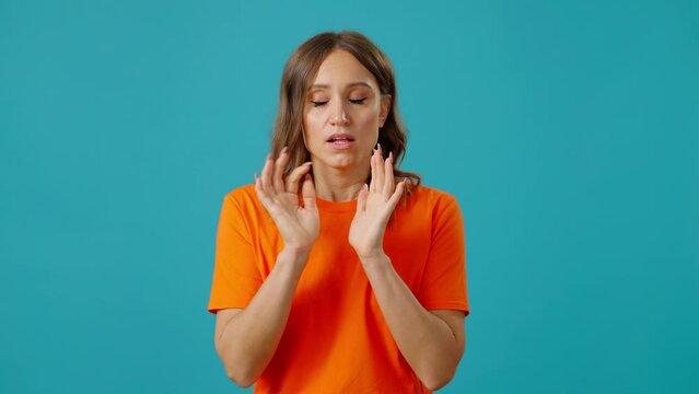 Worried woman takes deep breath trying to calm down