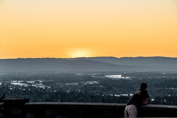 Sun Falling Below Horizon Hills in Portland, OR