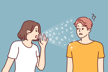 Language barrier between woman and man experiencing communication problems and standing near latin letters. Puzzled guy does not understand talking girl because of language barrier. © drawlab19