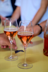 Tasting of sparkling rose wine with bubbles champagne on summer festival route of champagne in Cote des Bar, Champagne region, France
