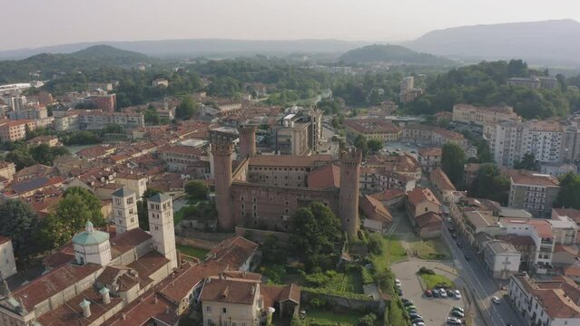 Drone orbit shot over Ivrea Castle