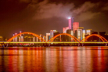 Naklejka premium night scenes of the Fuyuan Bridge in Changsha