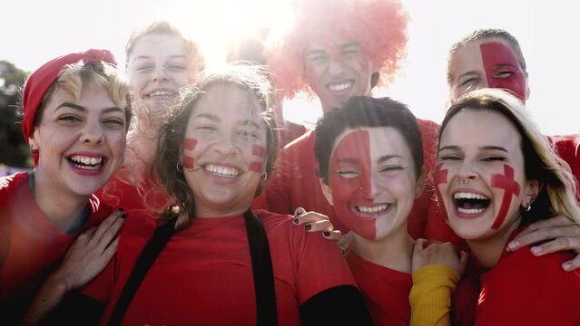 Crowd of football fans celebrating champions game at stadium - Soccer party and sport concept