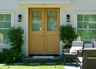 modern style farmhouse with a double Dutch front door