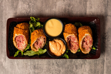 eggrolls stuffed with pastrami and sauerkraut