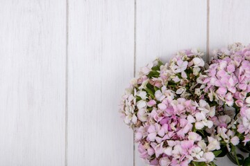 Fototapeta na wymiar lilac flowers on wooden background