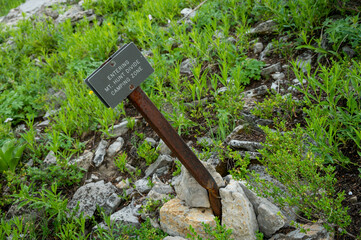 Entering Mt Hunt Divide Camping Zone Sign Bent By Years of Heavy Snow