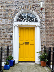 A famous yellow painted Georgian door in Dublin, Ireland