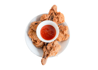 Crispy fried chicken in a plate isolated on white background. Fresh crunchy fried chicken on a white plate. Delicious hot and crispy fried chicken. Image about food of fast food restaurant.