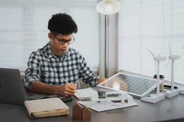 Engineers calculate the design of renewable energy, both wind and solar. selective focus, design concept of renewable energy, solar energy utilization, calculation, design solar installation system