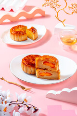 A mooncake  is a Chinese bakery product traditionally eaten during the Mid-Autumn Festival.