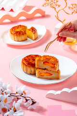 A mooncake  is a Chinese bakery product traditionally eaten during the Mid-Autumn Festival.
