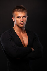 Fitness male model in studio