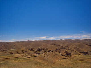 Dry and arid deserted region in a desert landscape in the mountains of Morocco.