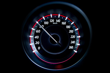 80 Kilometers per hour,light with car mileage with black background,number of speed,Odometer of car.